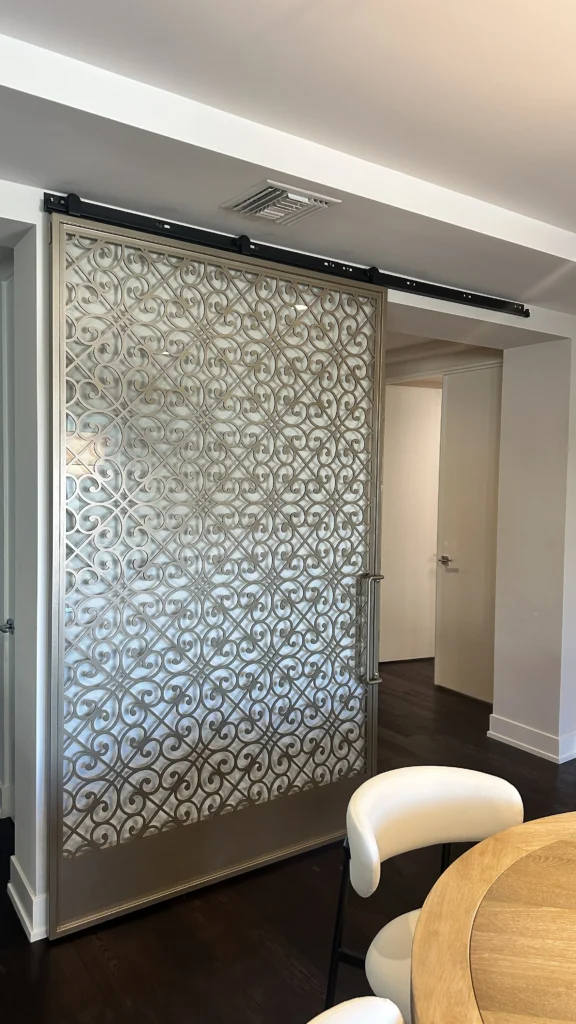 Decorative sliding barn door installed in a Los Angeles home