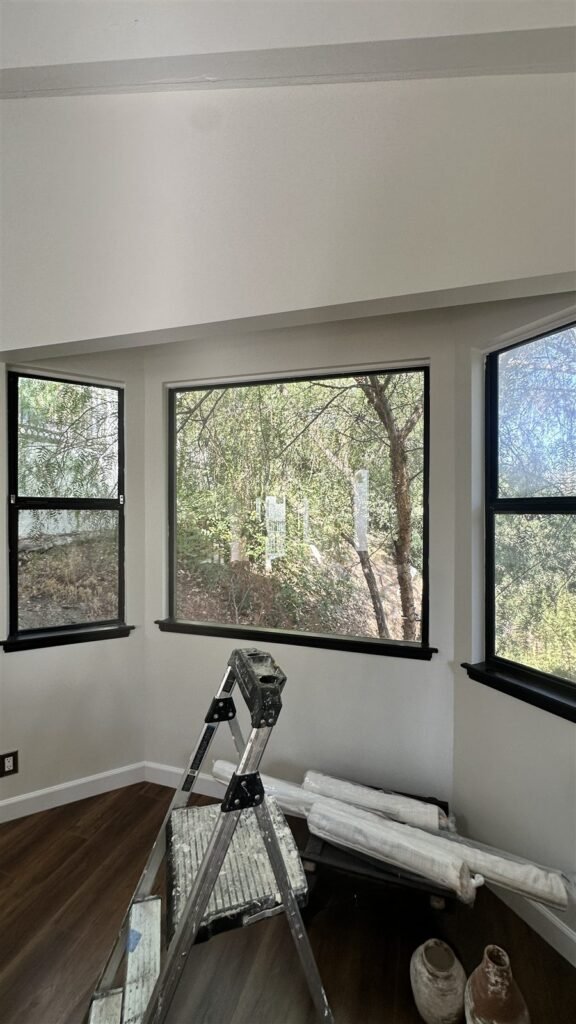 Roman shades installed in a corner window room in Los Angeles