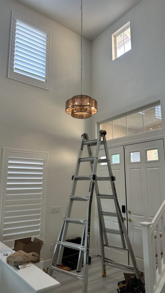 Plantation shutters and pendant light installed in a Los Angeles home