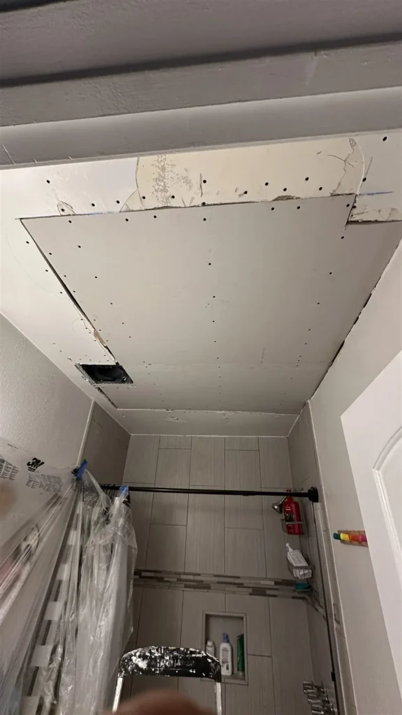 New ceiling drywall panel installed over a closet in Los Angeles