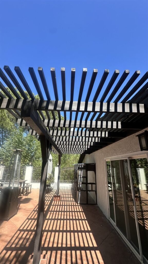 Pergola with wood slats over a patio in Los Angeles