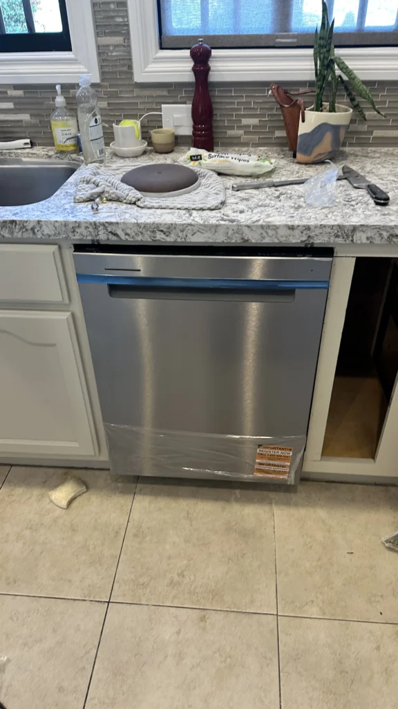 New dishwasher installed under a kitchen counter in Los Angeles