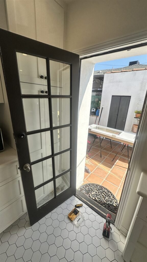 Black-framed glass door installed in a Los Angeles home