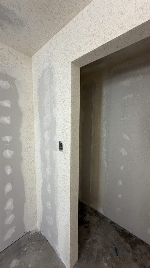 Freshly finished drywall wall opening in a Los Angeles home