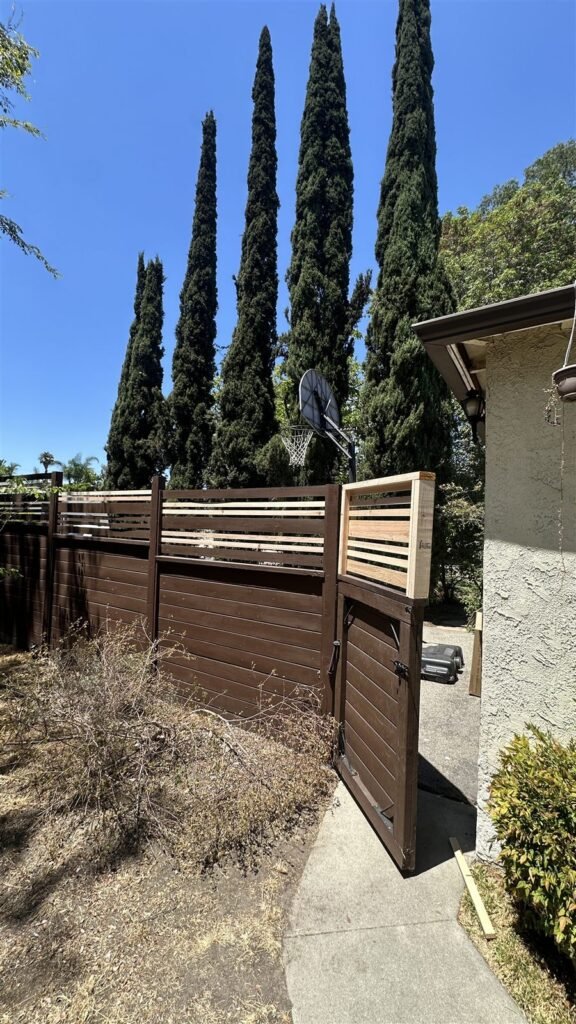Wood slat fence with horizontal top in Los Angeles