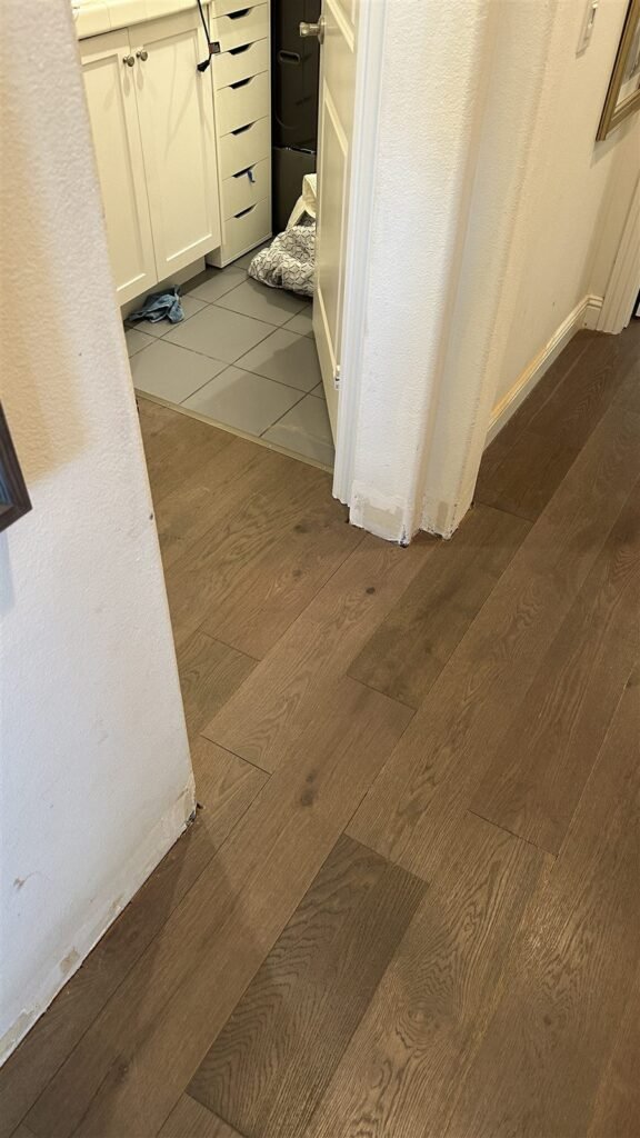 Hardwood floor and door casing in a Los Angeles hallway