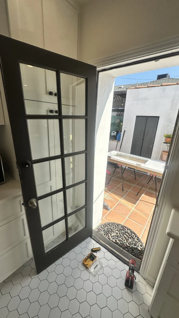 French doors open to a patio in a Los Angeles home