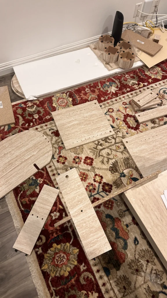Laminate flooring boards staged for installation in a Los Angeles home