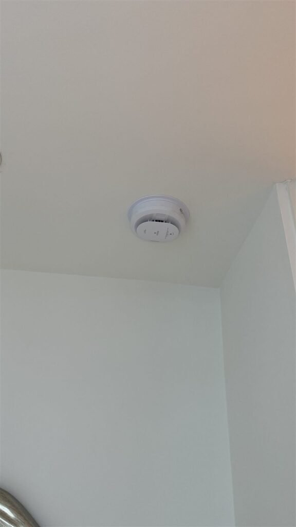 Smoke detector installed on a ceiling in Los Angeles