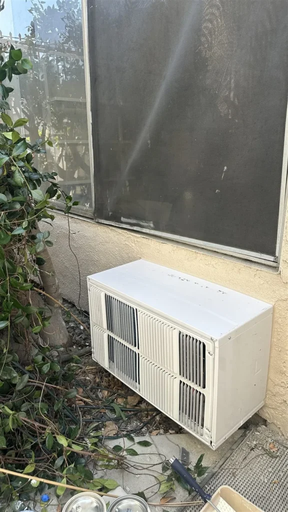 Window air conditioner outside a Los Angeles rental