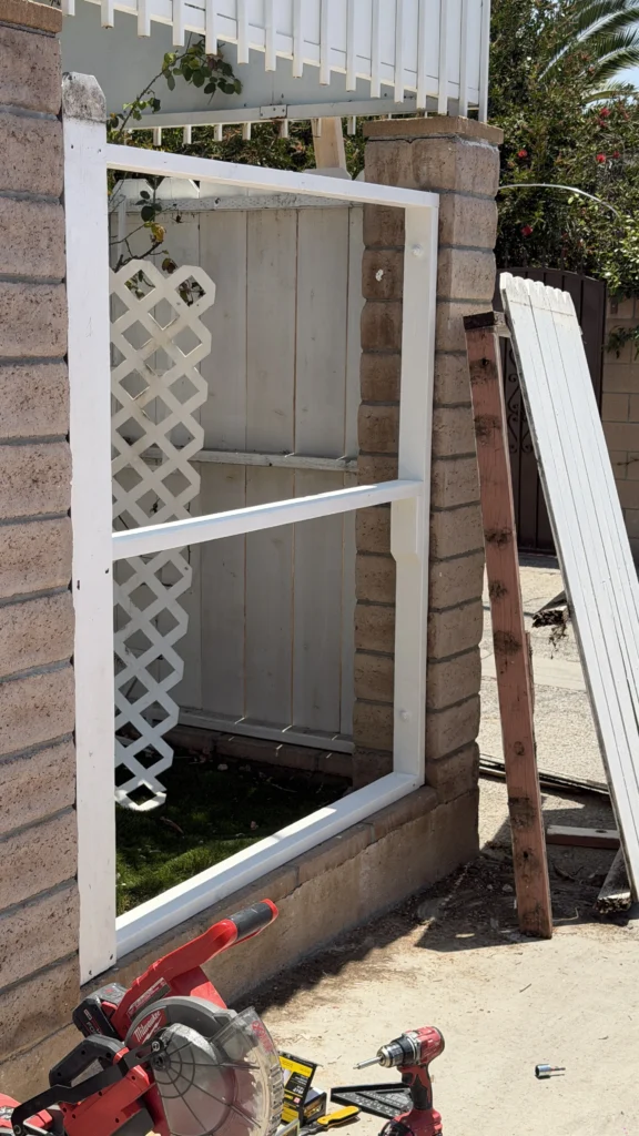 Garden gate frame repair in progress