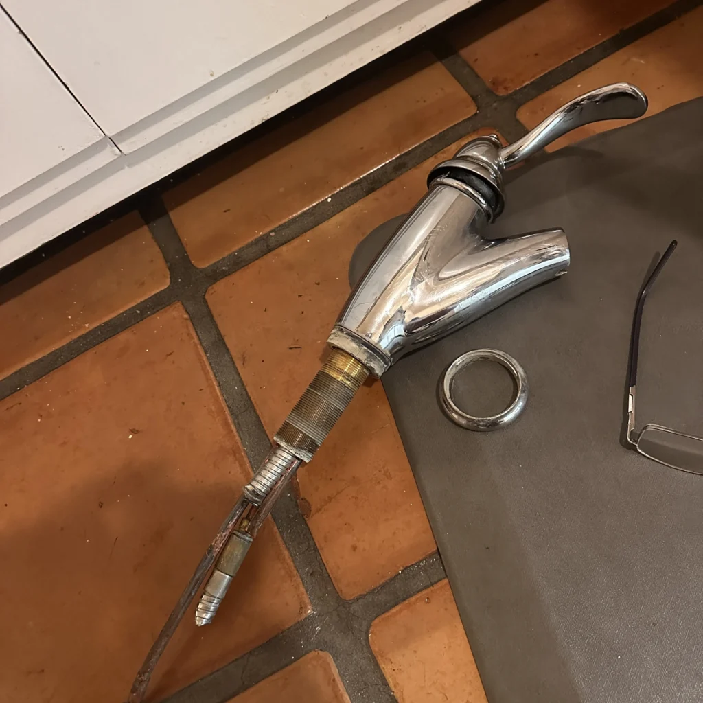 Kitchen faucet replacement in progress in a Los Angeles home