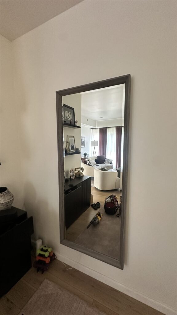 Full-length mirror mounted on a wall in Los Angeles