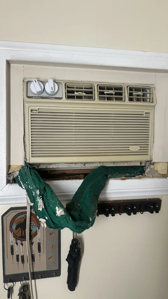 Window-mounted air conditioning unit installed