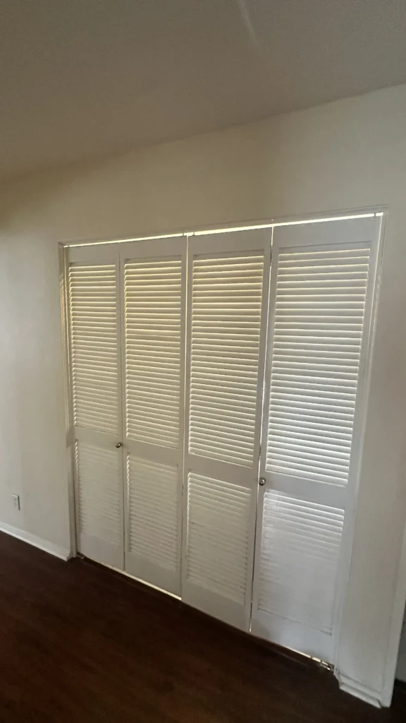 Louvered bifold closet doors installed