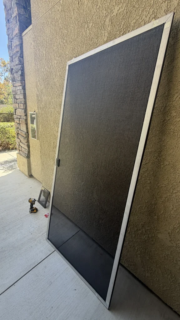 Window screen replacement in progress