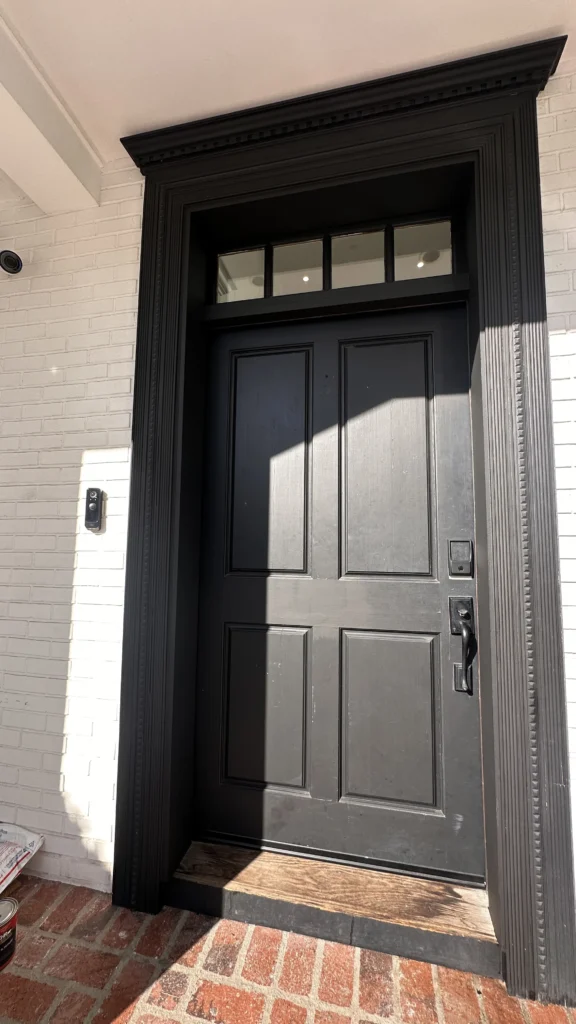 Black entry door hardware detail