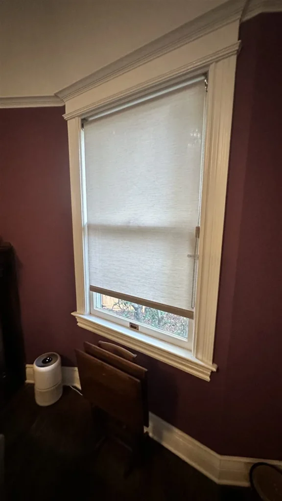 Roller shade installed on a bay window in Los Angeles