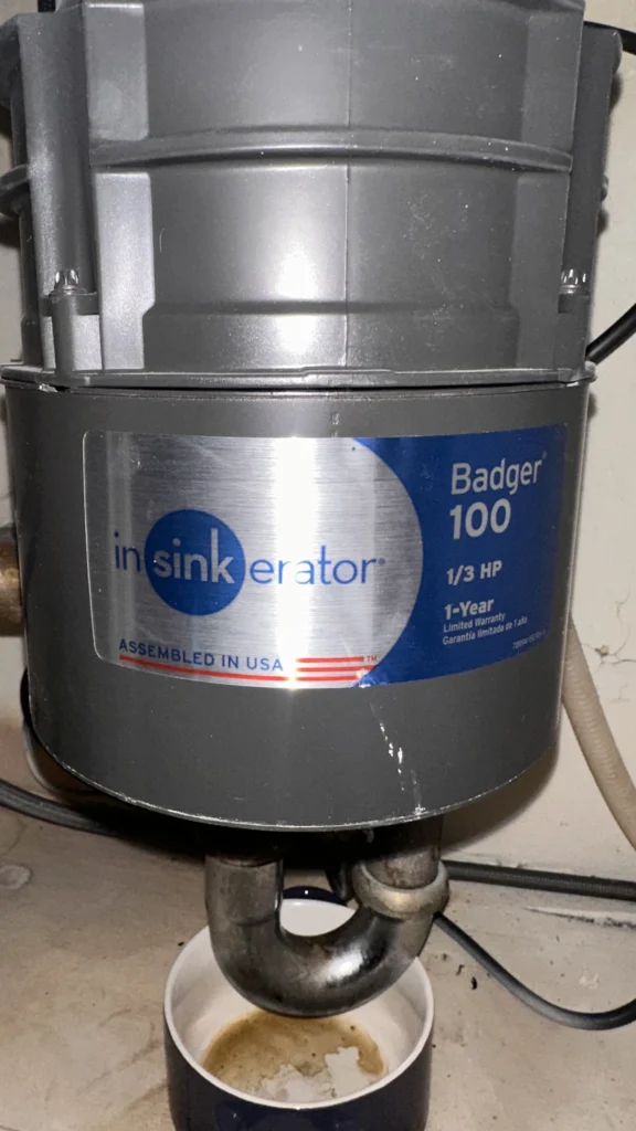 Garbage disposal unit close-up after installation