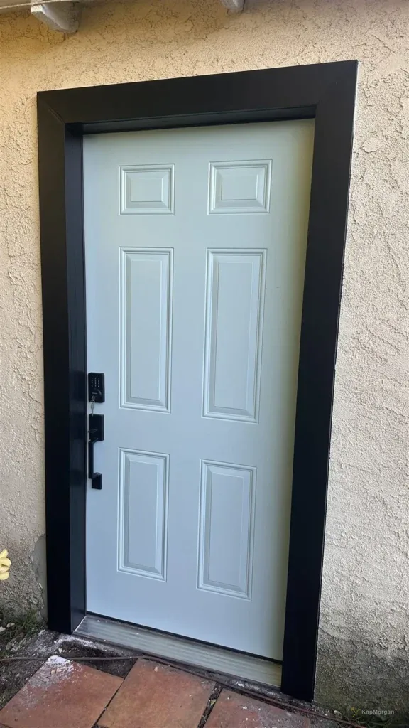 New light blue exterior door with black trim installed in Los Angeles