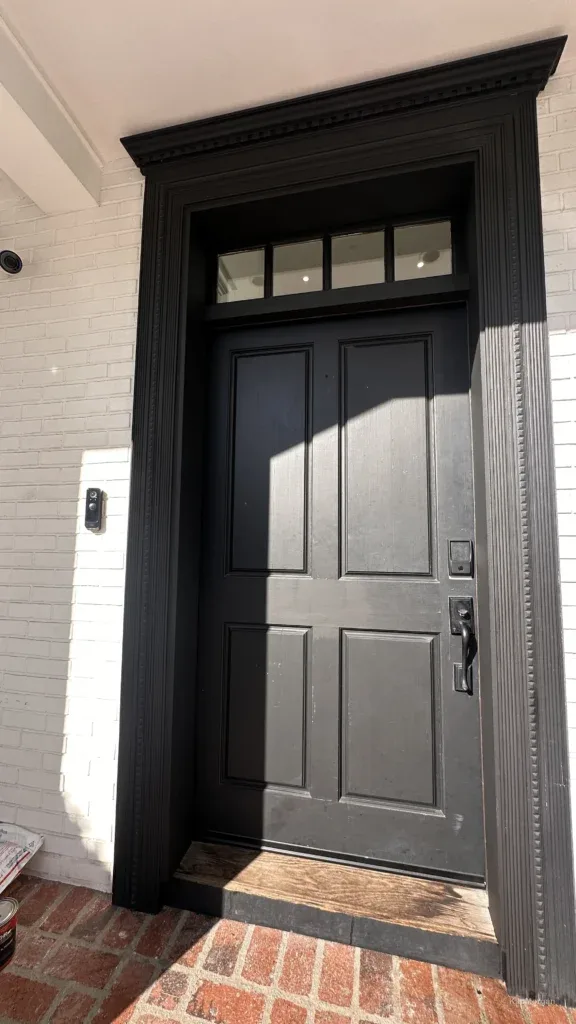 Black entry door installed in a Los Angeles home