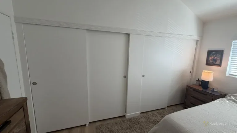 After: repaired sliding closet doors with new track and molding, Van Nuys