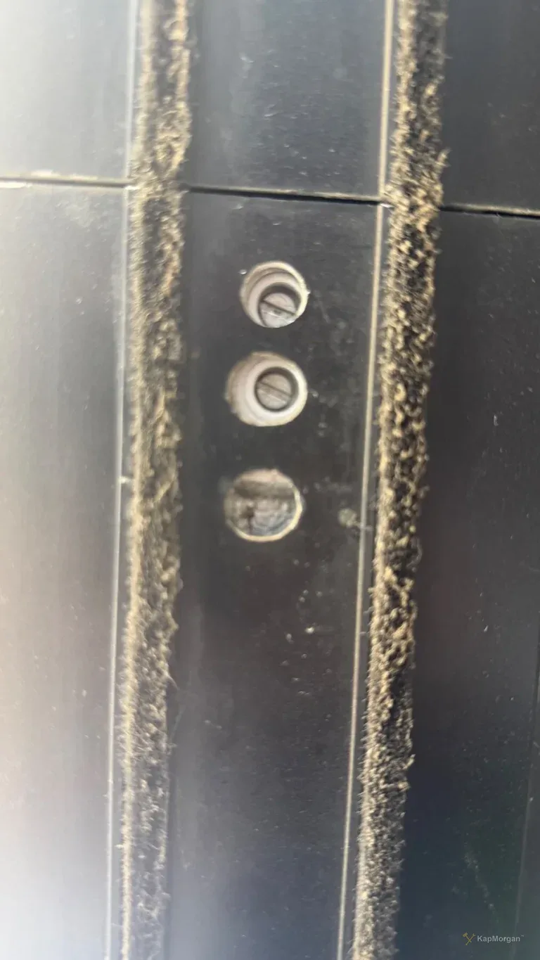 Storefront door that would not close, before the closer repair